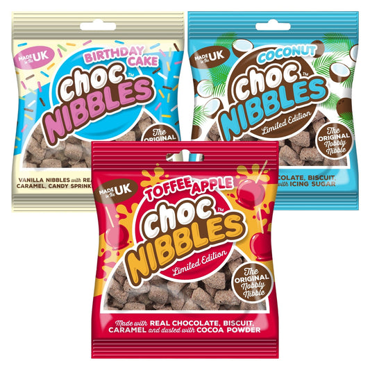 Three packages of Choc Nibbles with different flavors on a white background